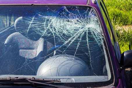 A Car Windscreen damaged showing accident.